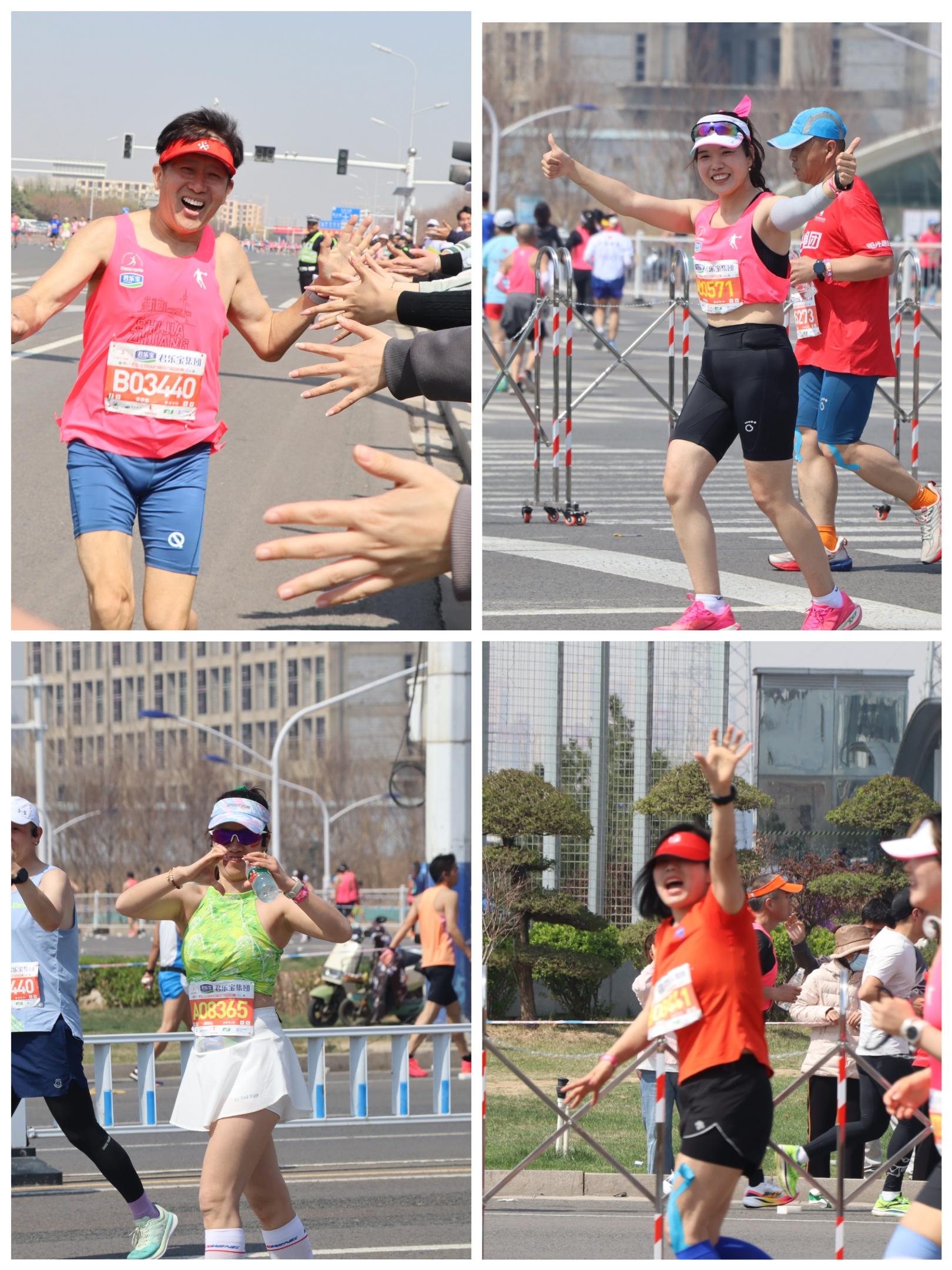 马拉松运动员与我校志愿者积极互动.jpg 马拉松运动员与我校志愿者积极互动.jpg